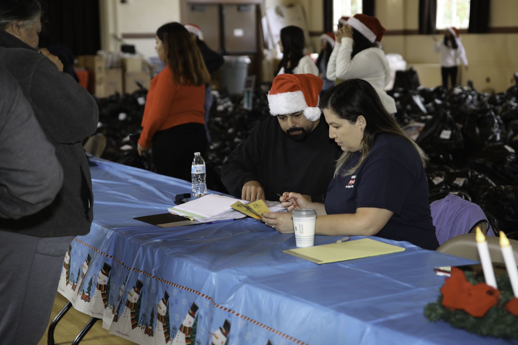 Volunteers distribute toys at Toys for Tots in Lompoc